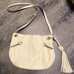 Cream colored Vince Camuto leather crossbody purse